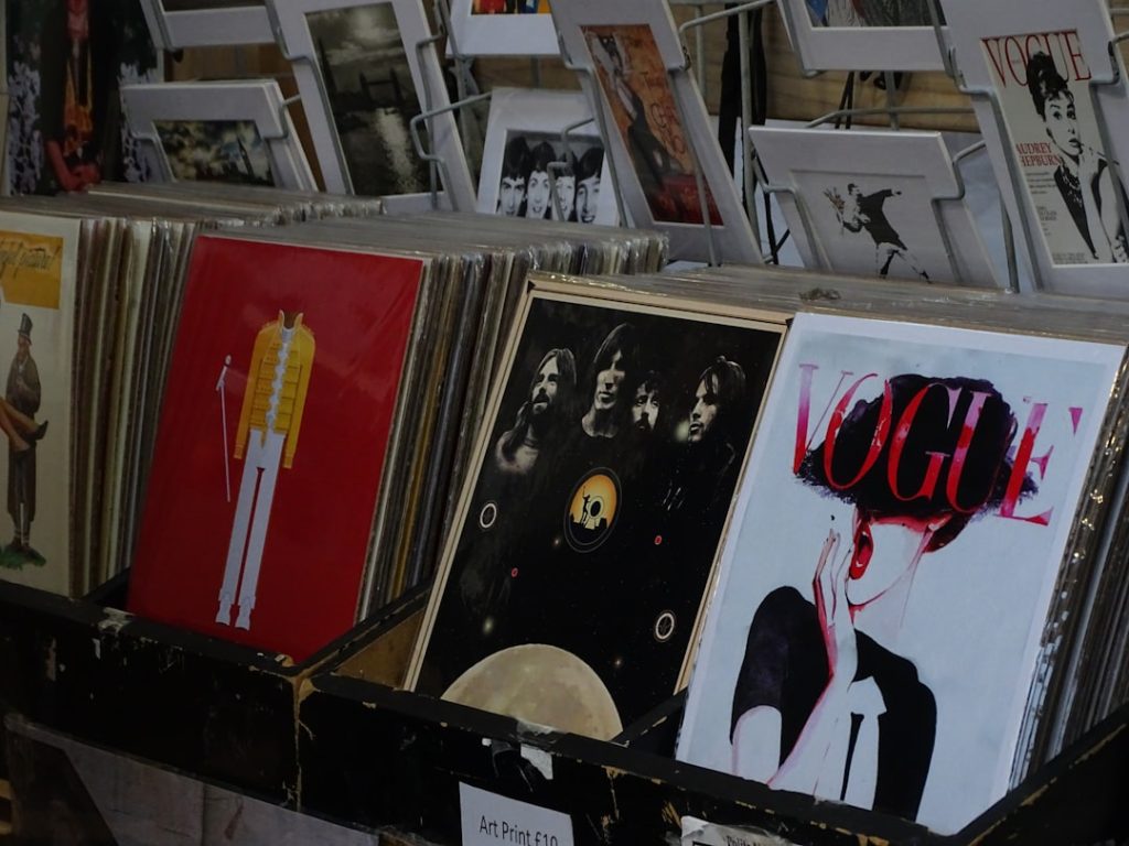 a-bunch-of-posters-that-are-on-a-table-f73oyosah-i